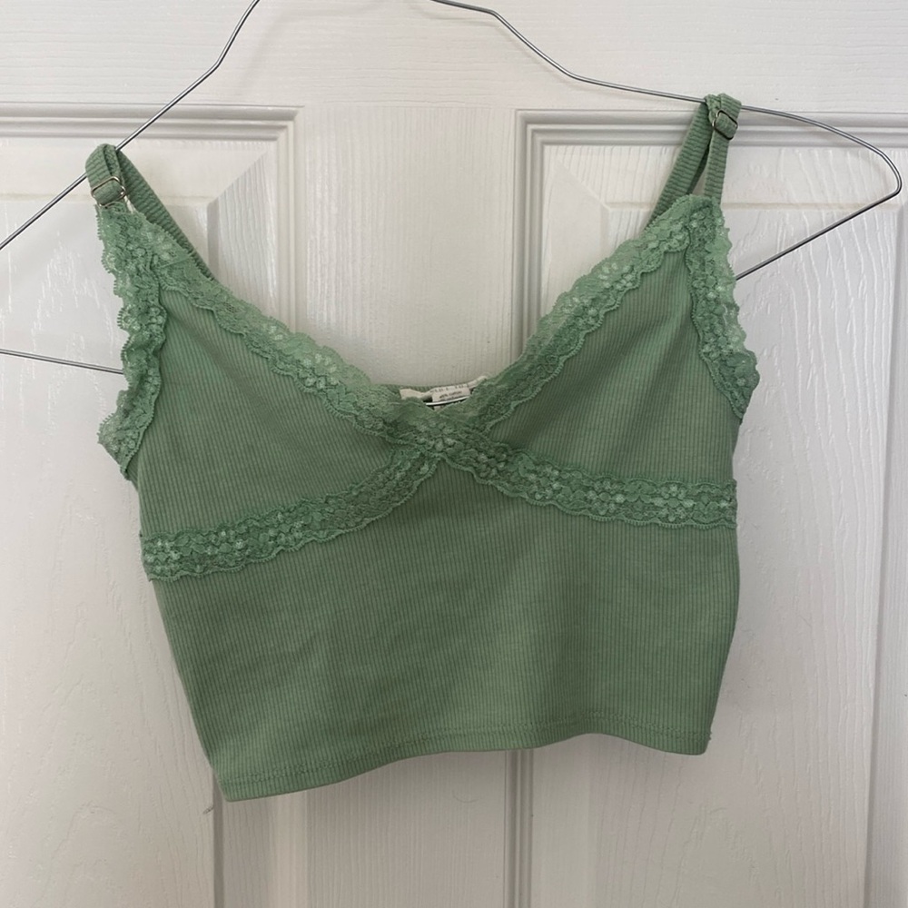 Green thin spaghetti strap crop top with adjustable straps and lace design